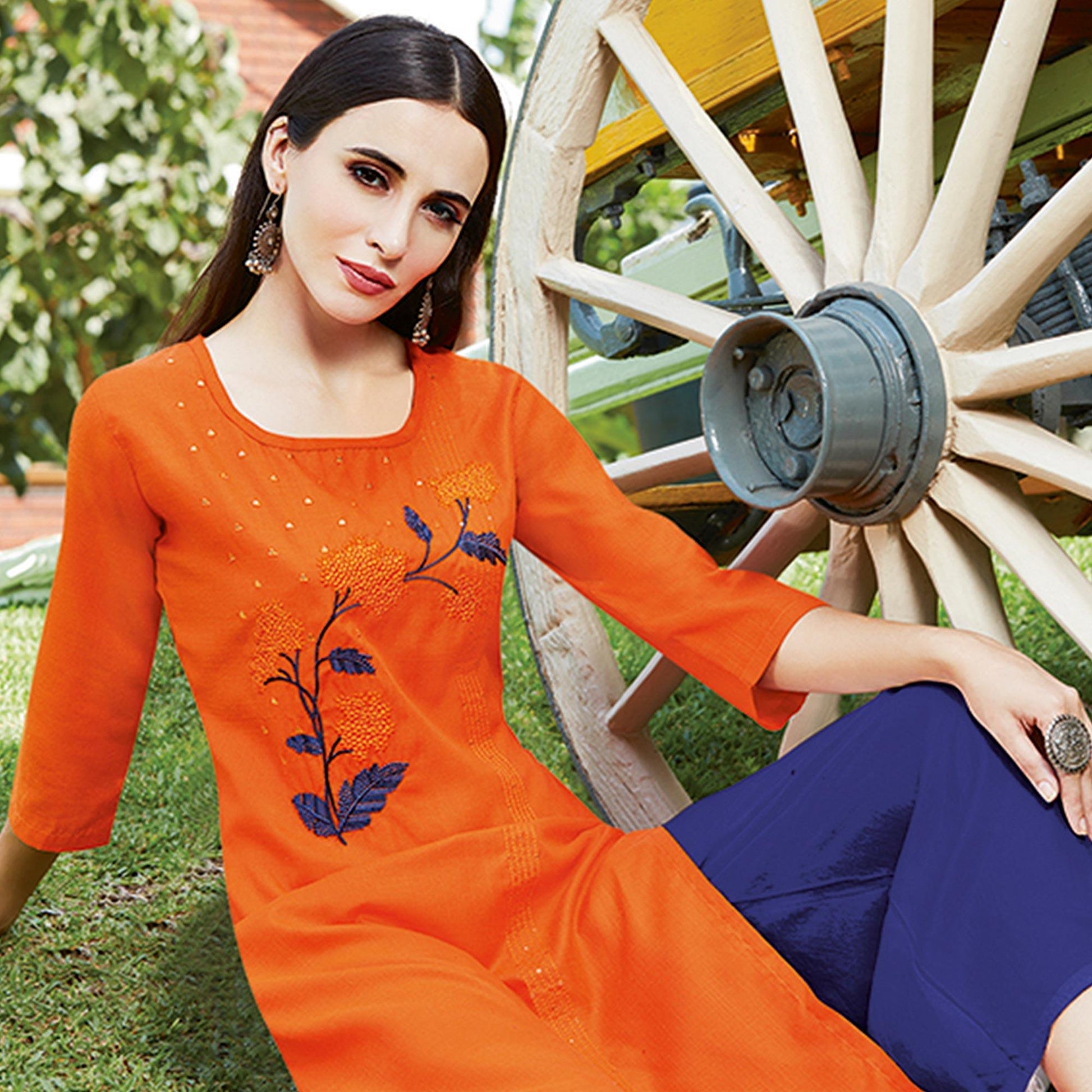 graceful-orange-colored-casual-wear-embroidered-cotton-sulb-kurti-105354