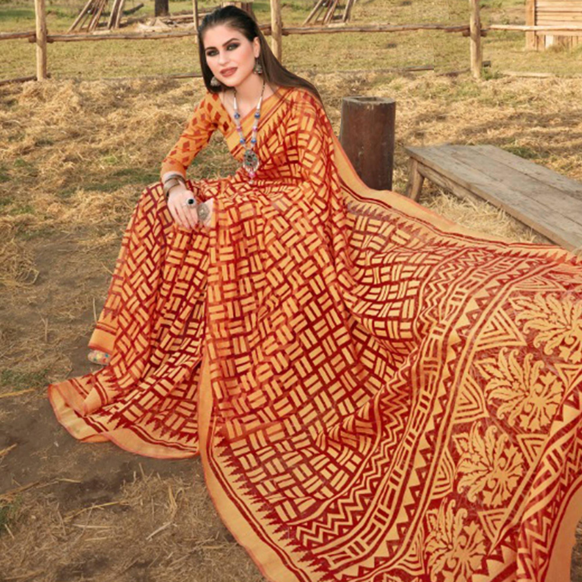graceful-red-orange-colored-casual-wear-printed-brasso-saree-47061