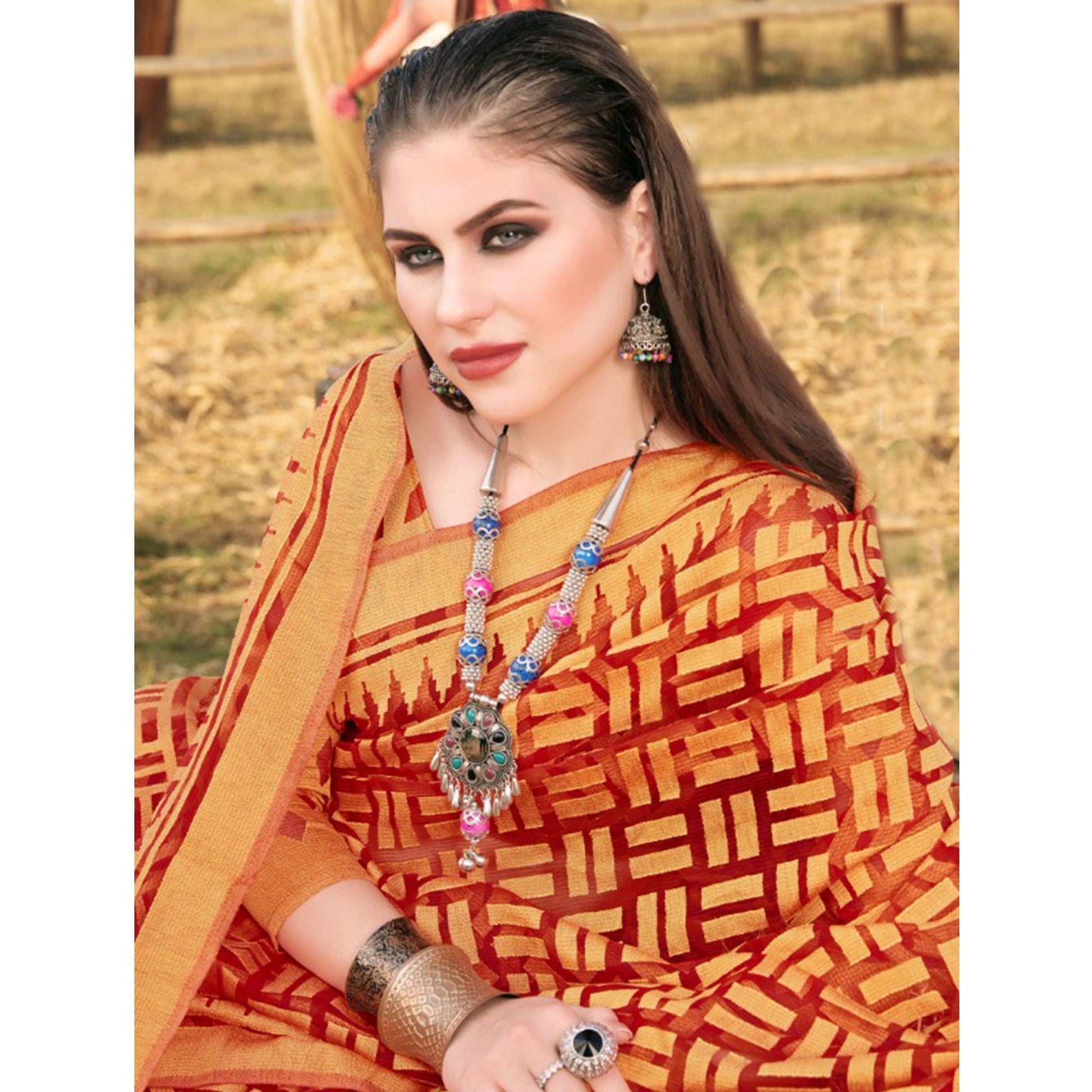 graceful-red-orange-colored-casual-wear-printed-brasso-saree-47061