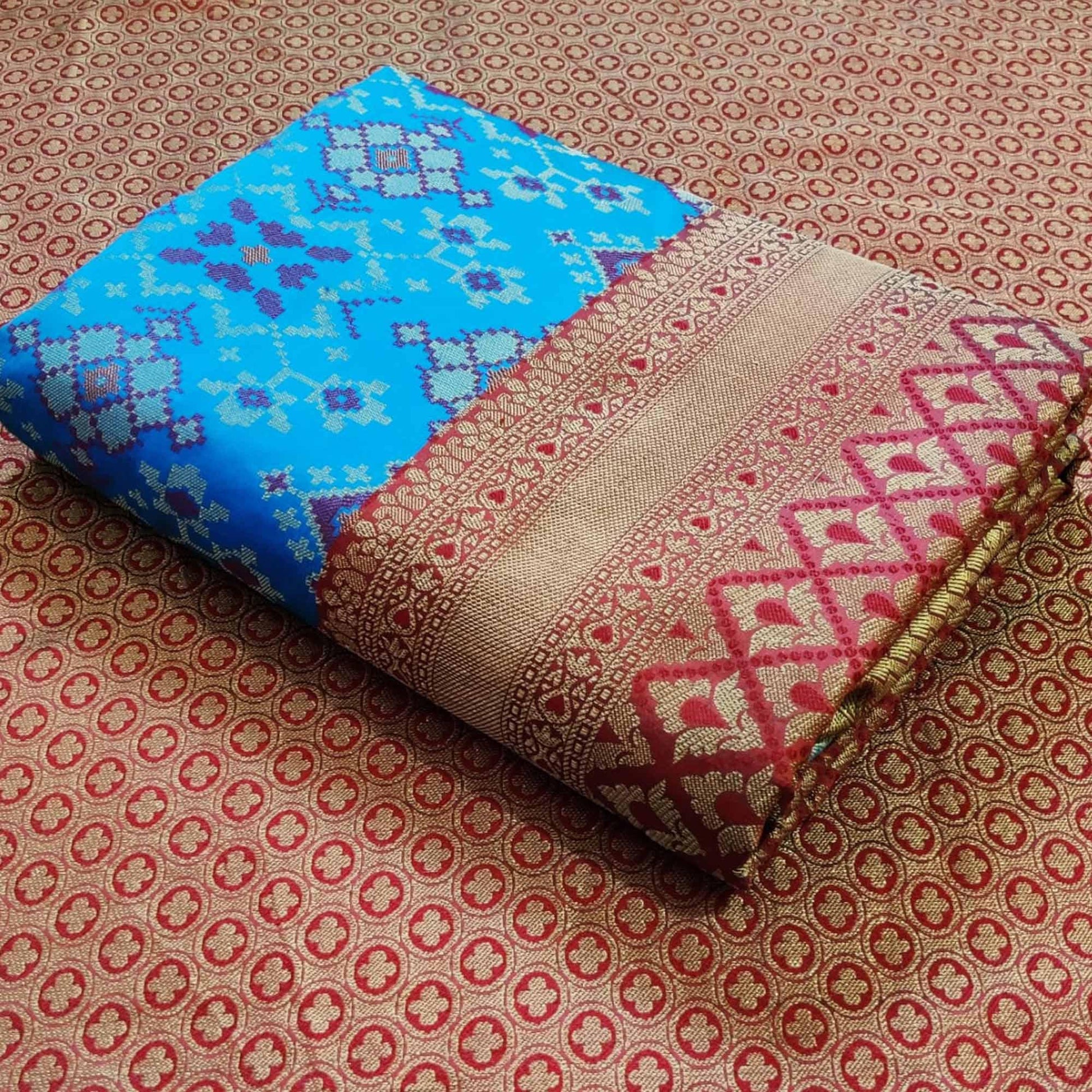 graceful-sky-blue-colored-festive-wear-woven-patola-silk-saree-97751