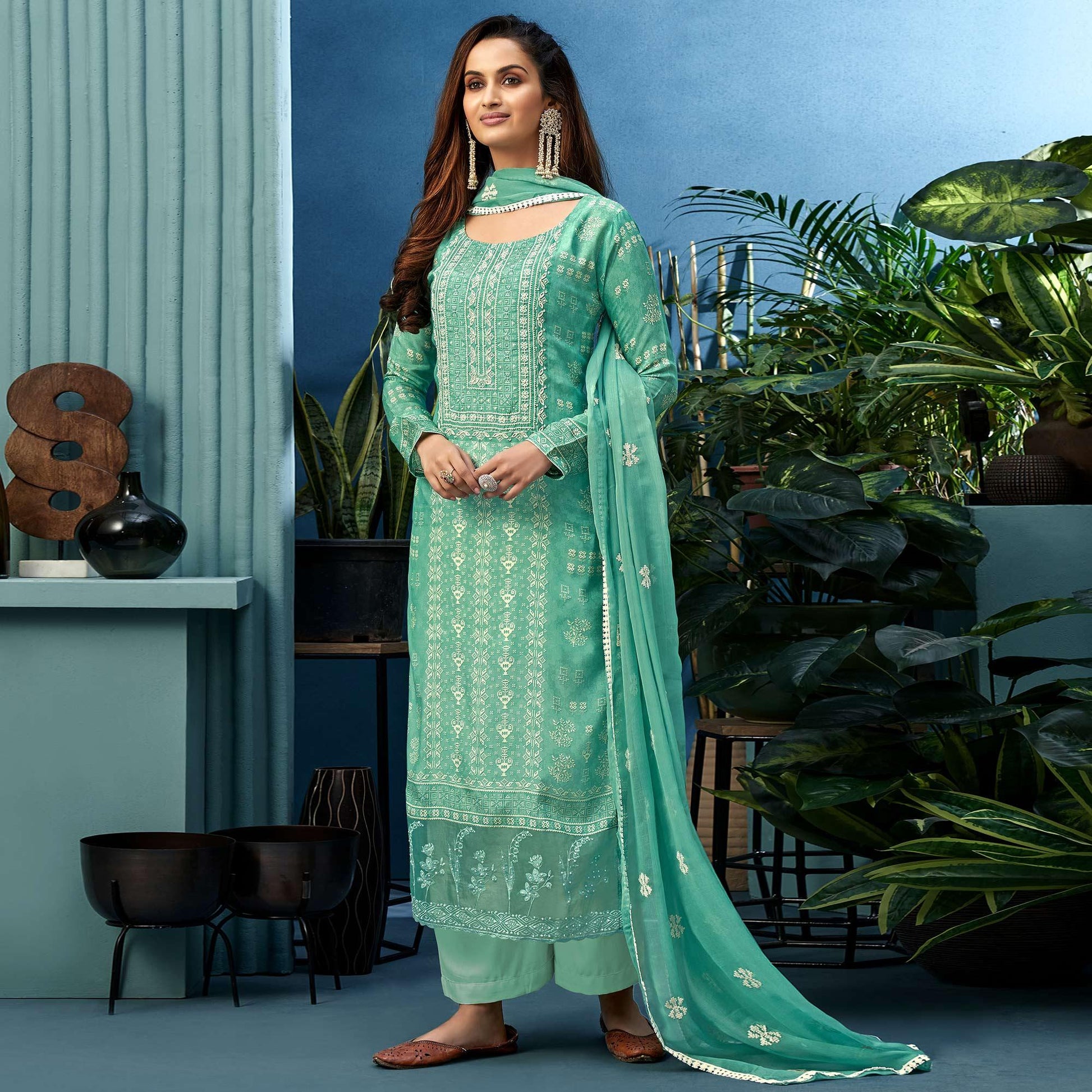 graceful-turquoise-blue-colored-partywear-digital-printed-pure-muslin-palazzo-suit-100104