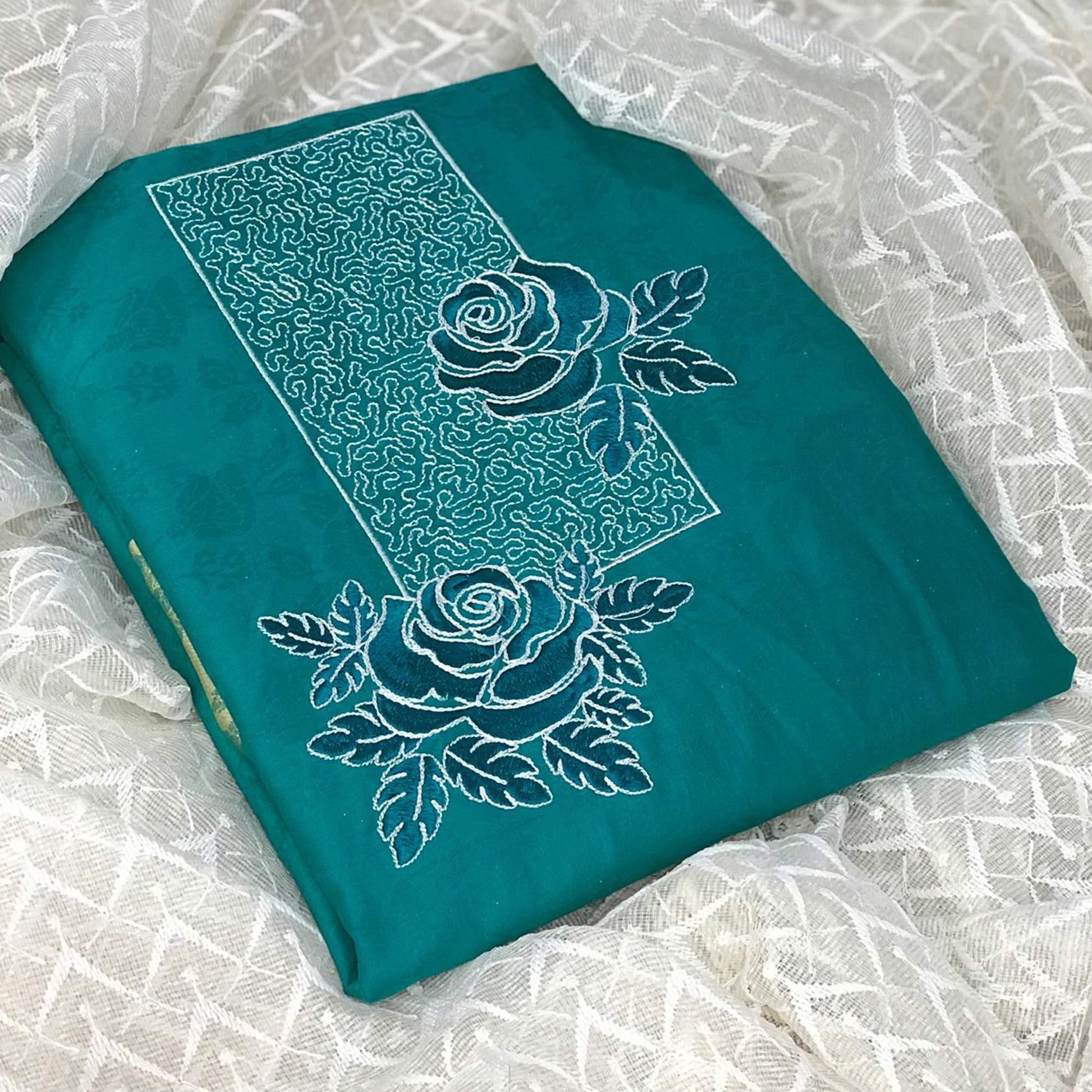 graceful-turquoise-blue-colored-partywear-embroidered-cotton-dress-material-75740