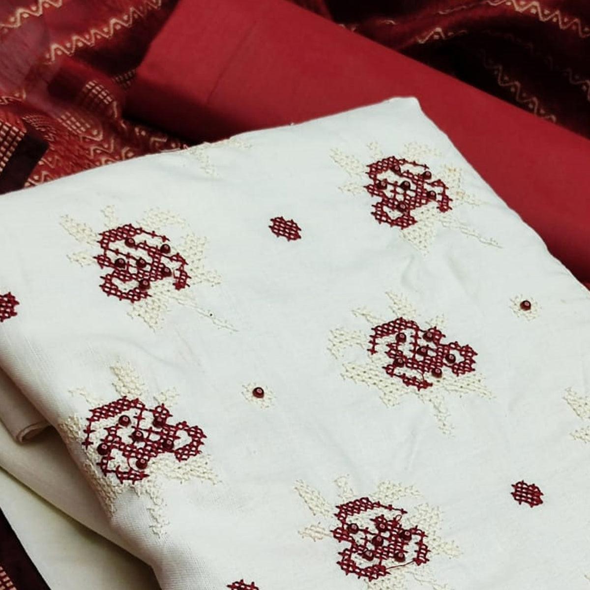 graceful-white-red-colored-partywear-embroidered-cotton-dress-material-104498