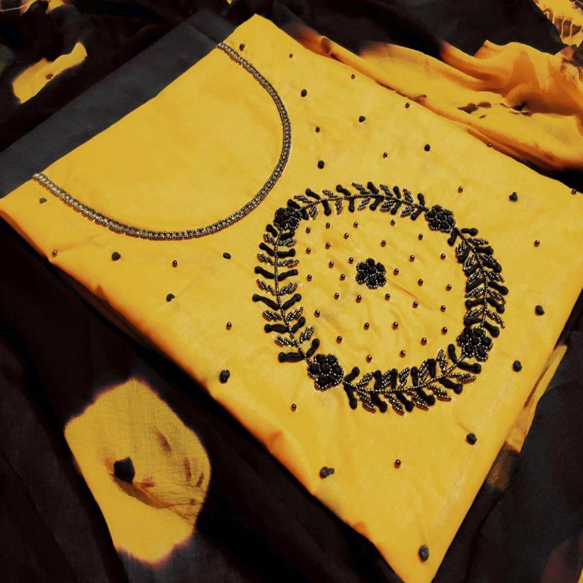 graceful-yellow-colored-party-wear-embroidered-modal-dress-material
