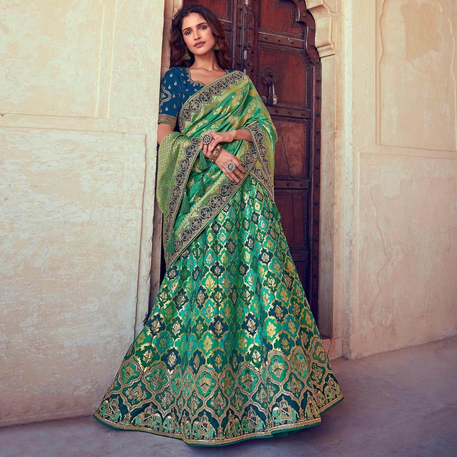 green-blue-wedding-wear-woven-embroidered-silk-lehenga-choli-126754