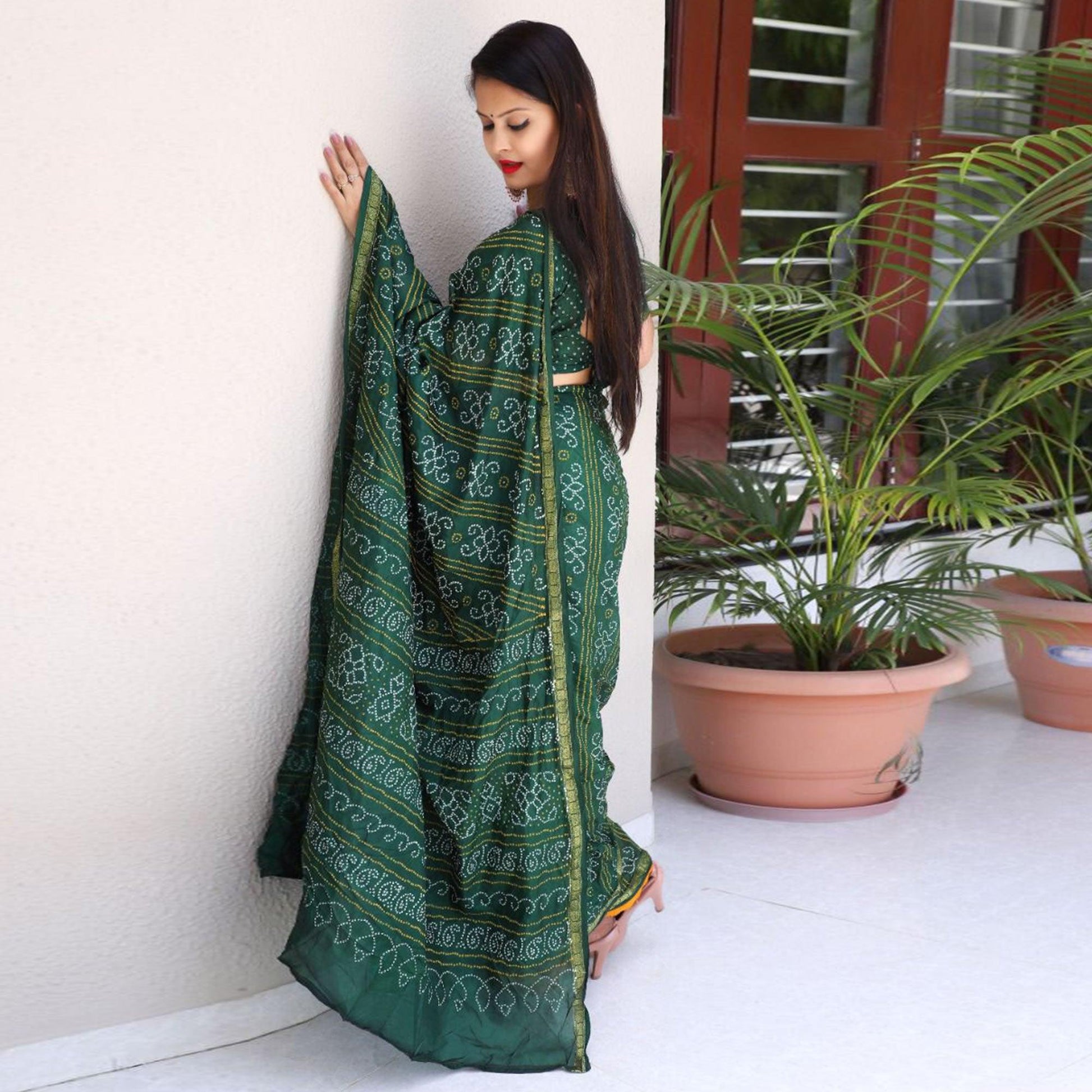 green-bandhani-printed-with-woven-border-tapetta-silk-saree-1