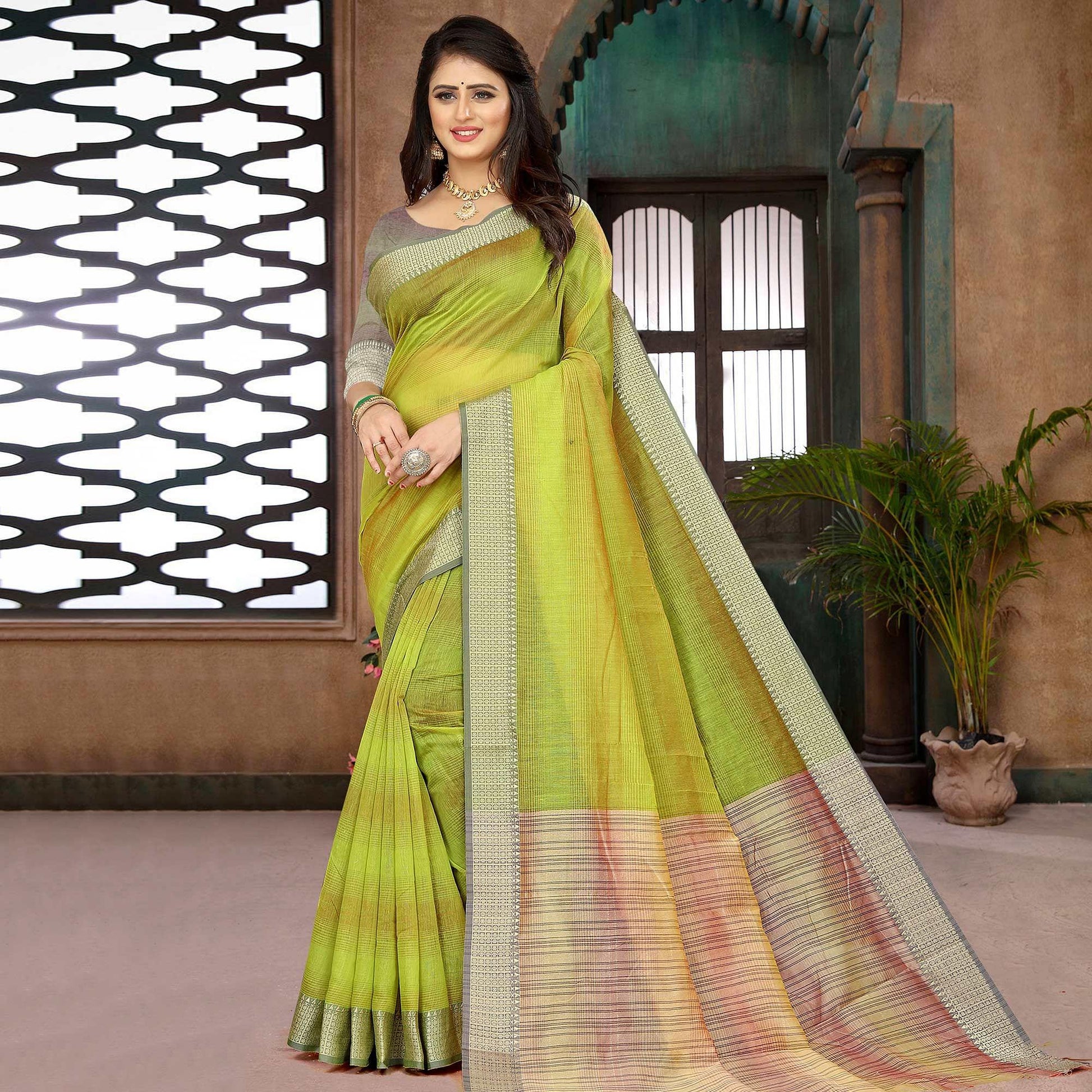 green-casual-wear-cotton-saree-with-woven-border-114079