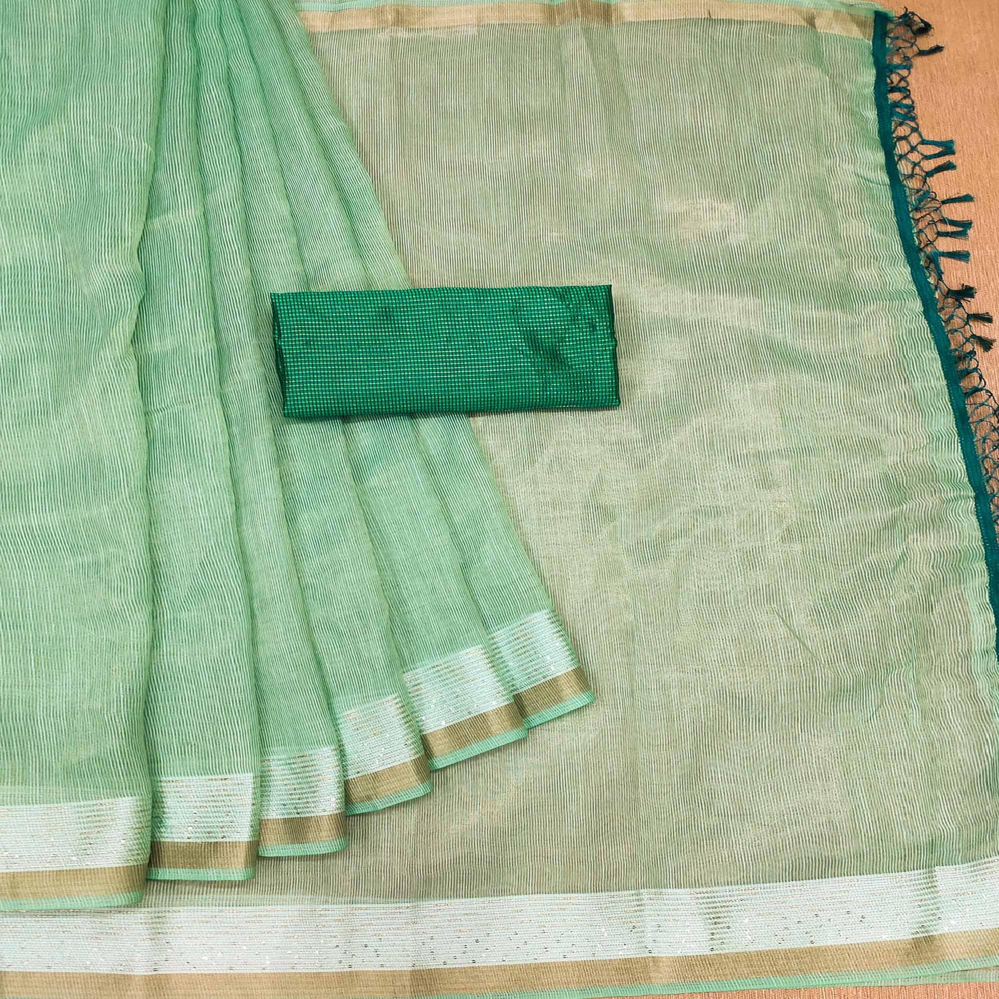 green-casual-wear-embroidered-cotton-saree-with-tassels-140631