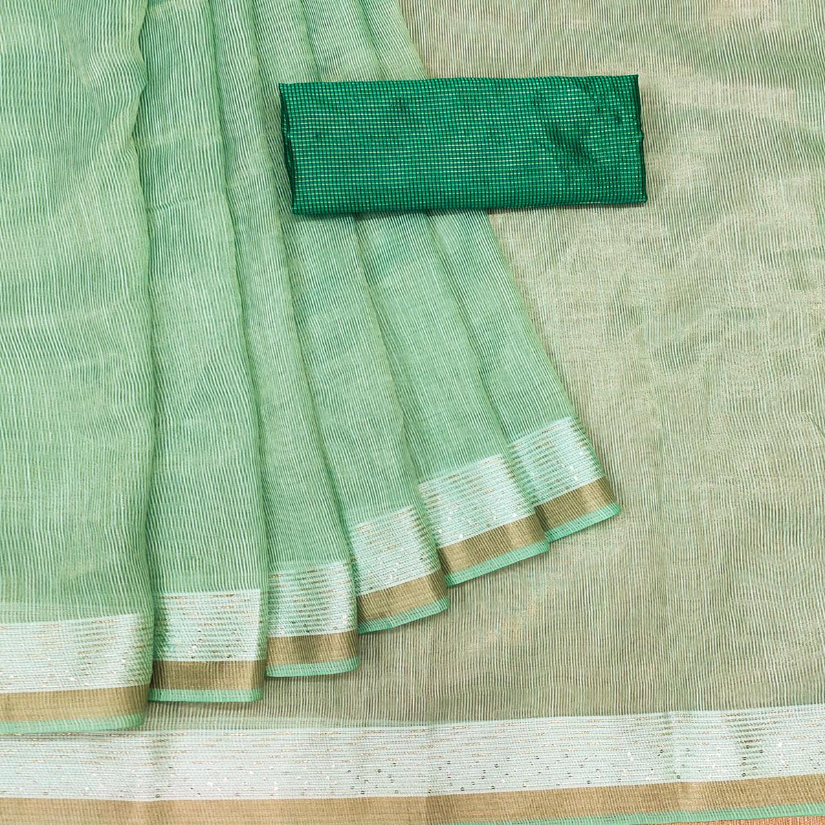 green-casual-wear-embroidered-cotton-saree-with-tassels-140631