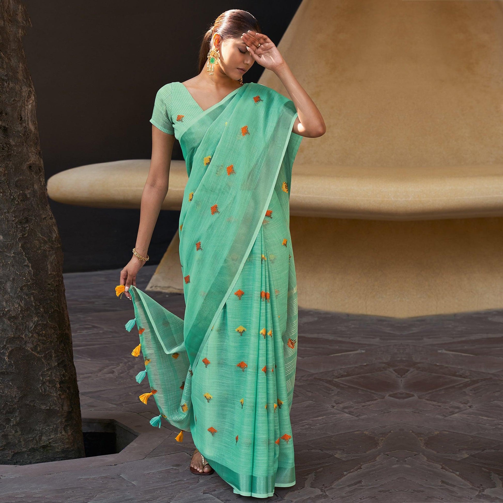 green-casual-wear-embroidered-linen-saree-132581