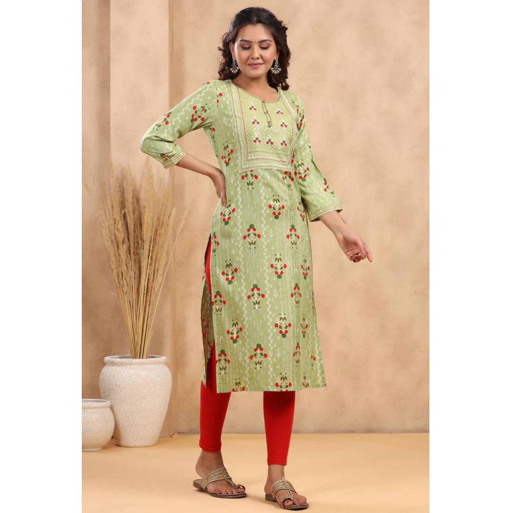 green-casual-wear-floral-print-with-sequence-rayon-kurti-141974