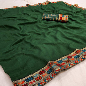 green-casual-wear-jacquard-lace-border-silk-saree-with-tassels-139263