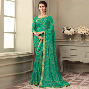 green-casual-wear-printed-chiffon-saree-with-banarasi-border-134142