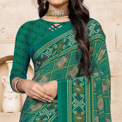 green-casual-wear-printed-crepe-saree-140153