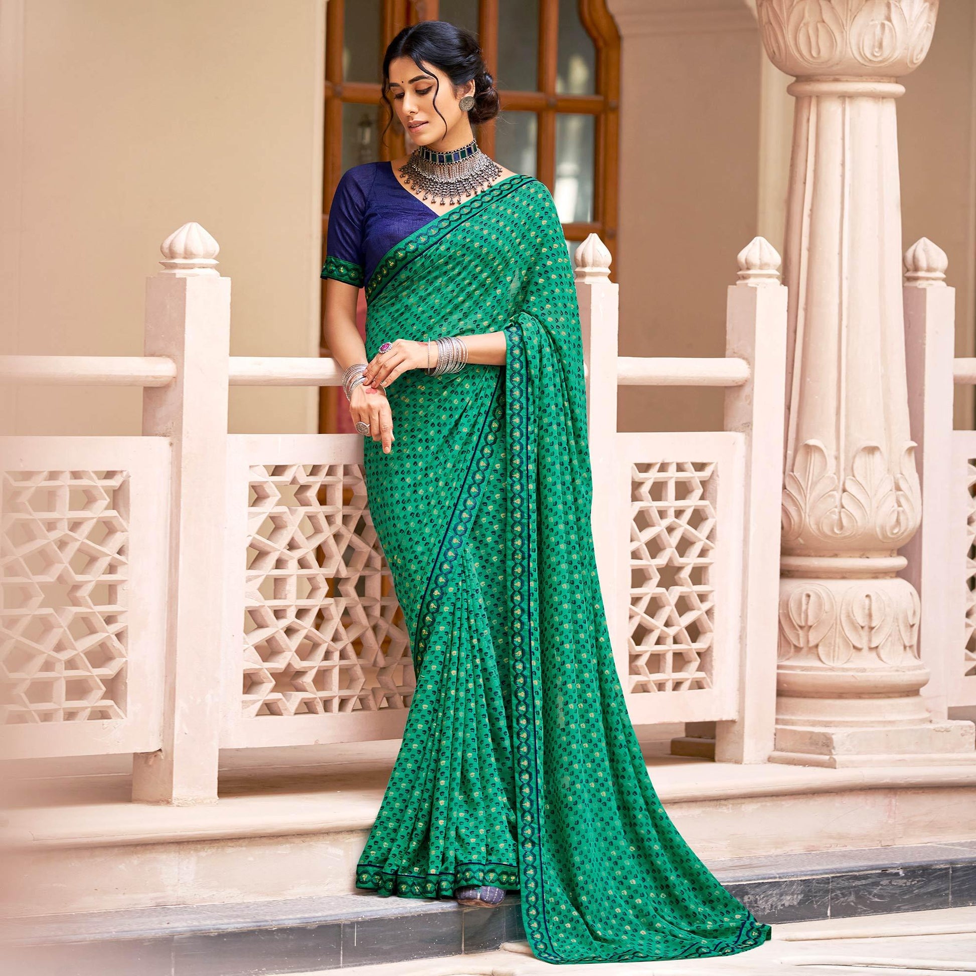 green-casual-wear-printed-weightless-georgette-saree-127375