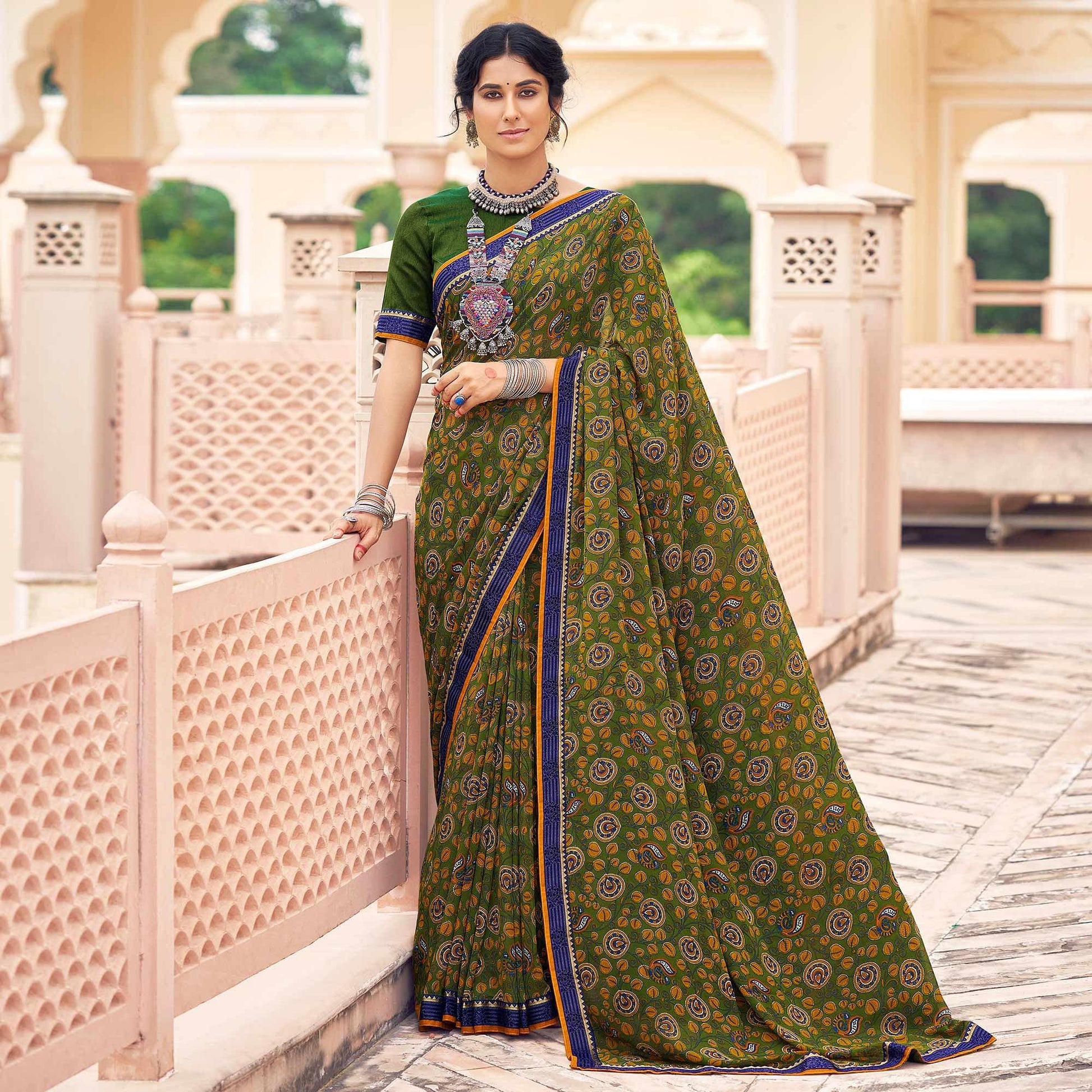 green-casual-wear-printed-weightless-georgette-saree-127378