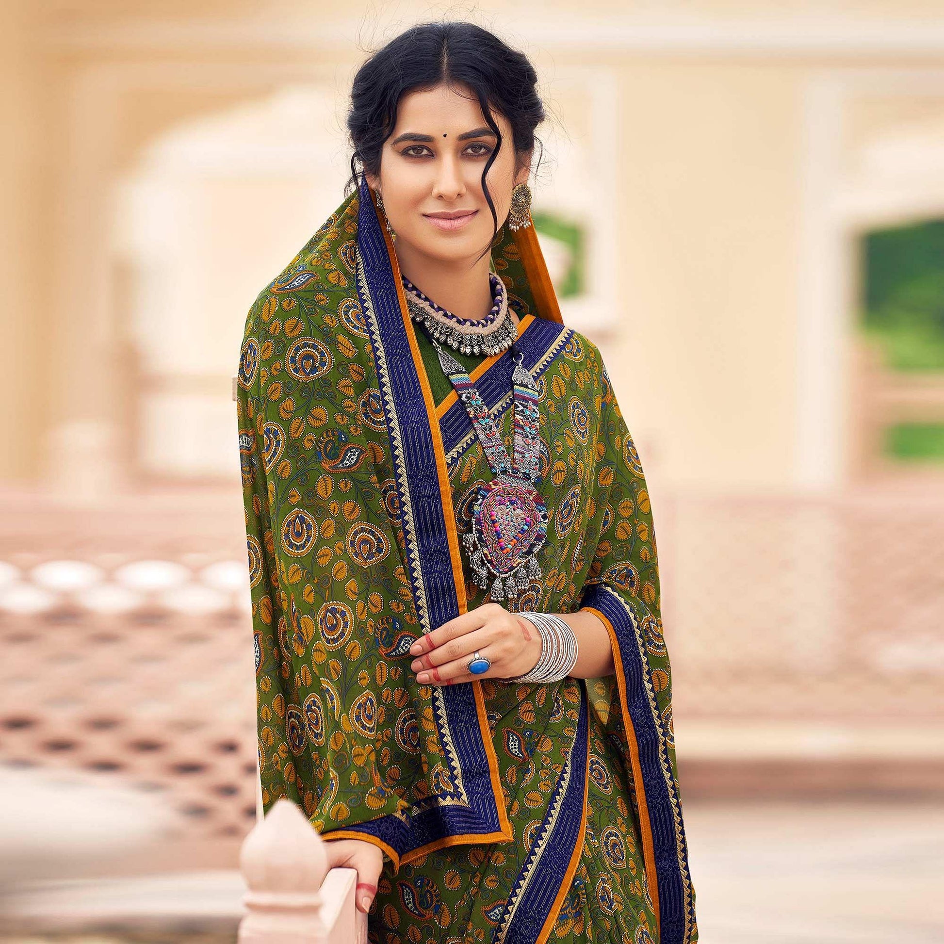 green-casual-wear-printed-weightless-georgette-saree-127378