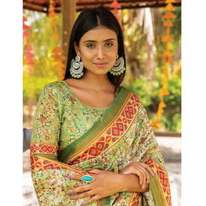 green-digital-printed-linen-saree-with-tassels