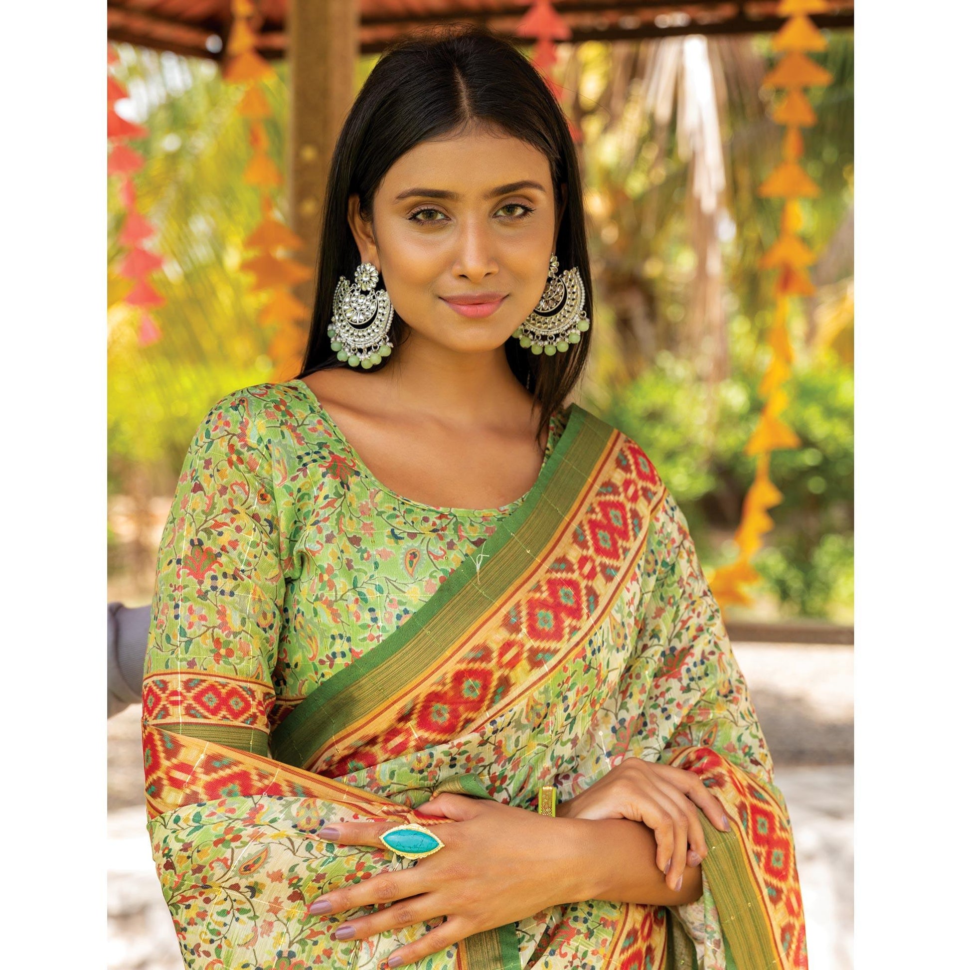 green-digital-printed-linen-saree-with-tassels