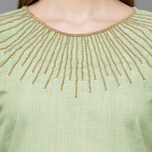 attractive-green-colored-partywear-embroidered-cotton-kurti