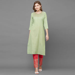 attractive-green-colored-partywear-embroidered-cotton-kurti