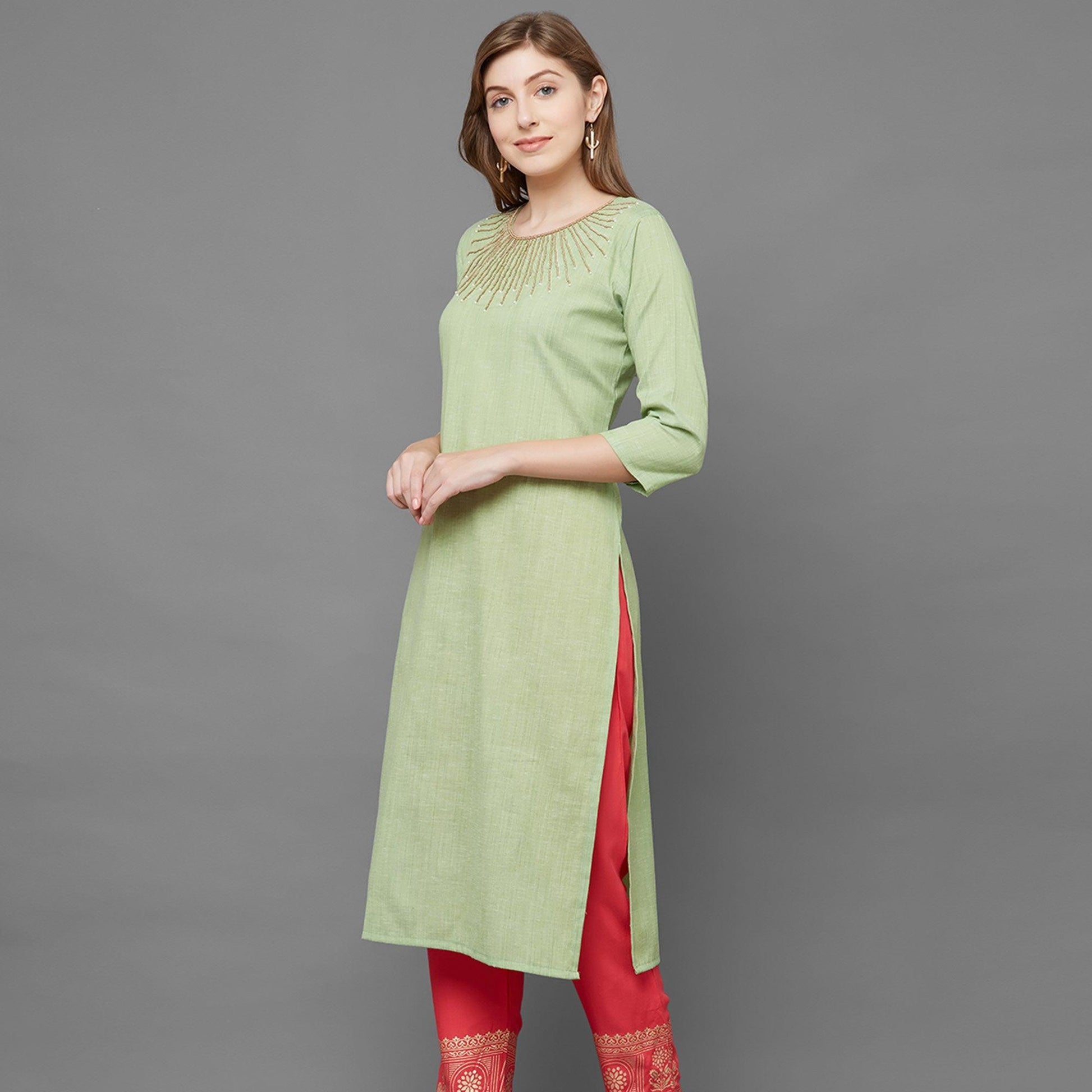 attractive-green-colored-partywear-embroidered-cotton-kurti