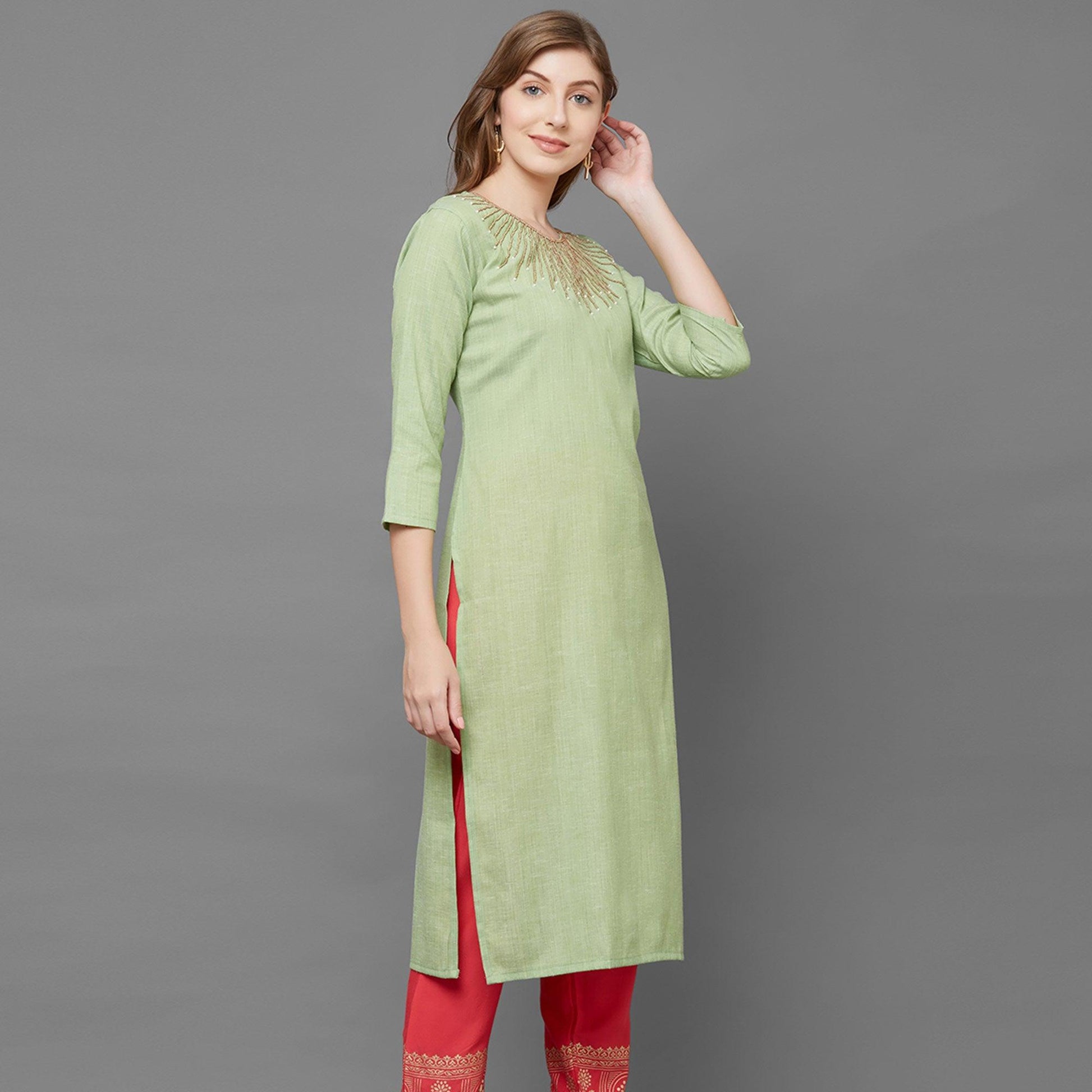 attractive-green-colored-partywear-embroidered-cotton-kurti