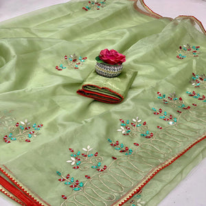 green-embellished-with-embroidered-organza-saree