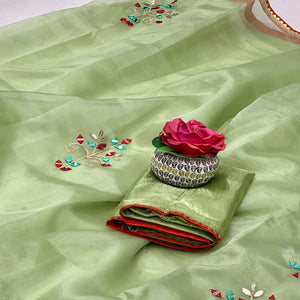 green-embellished-with-embroidered-organza-saree