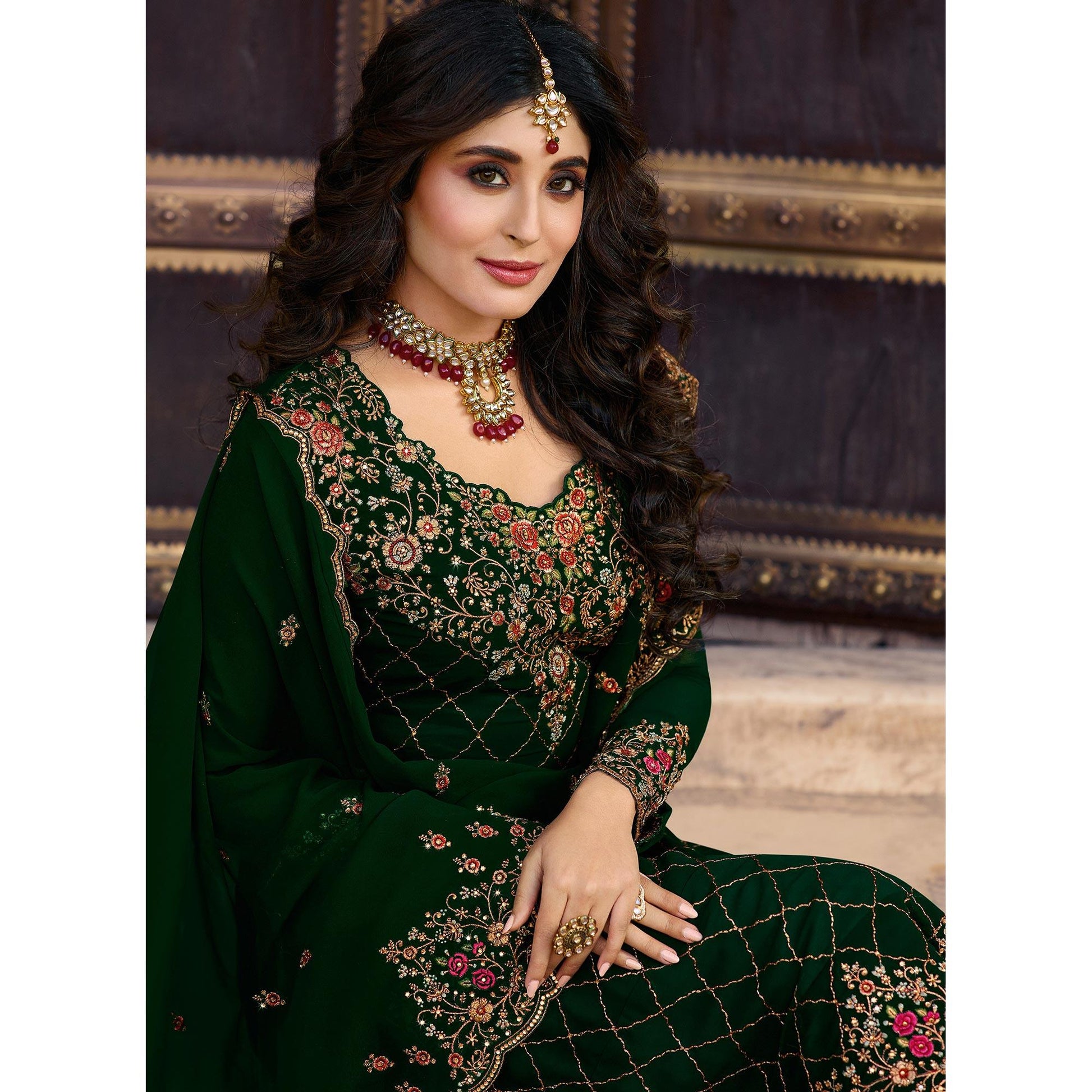 demanding-green-colored-partywear-embroidered-faux-georgette-suit-65536