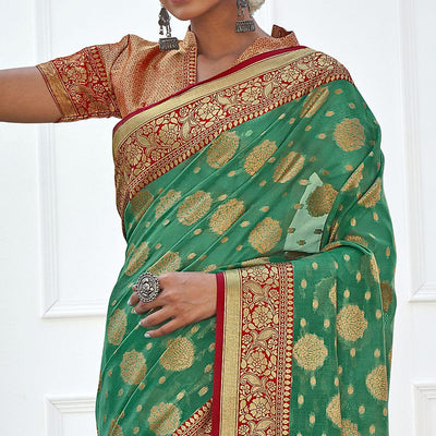 green-festive-wear-banarasi-woven-organza-saree-with-tassels-137616