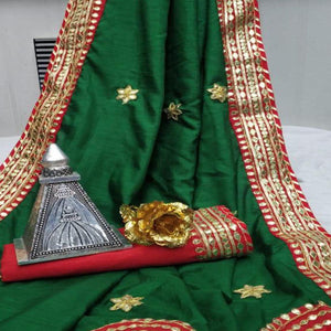 green-festive-wear-dola-silk-saree-with-gotta-patti-lace-border-123981