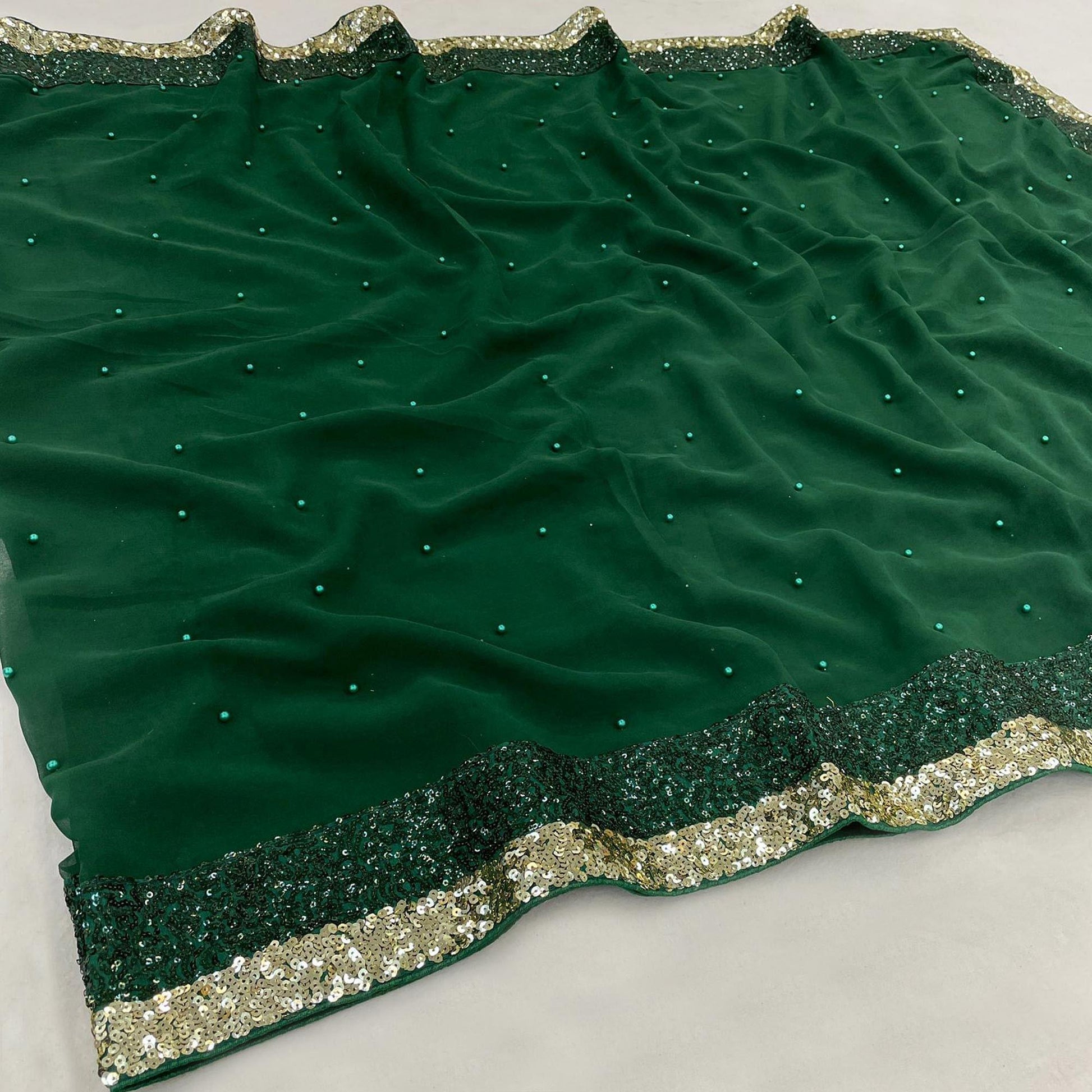 green-festive-wear-embellished-georgette-saree-142826
