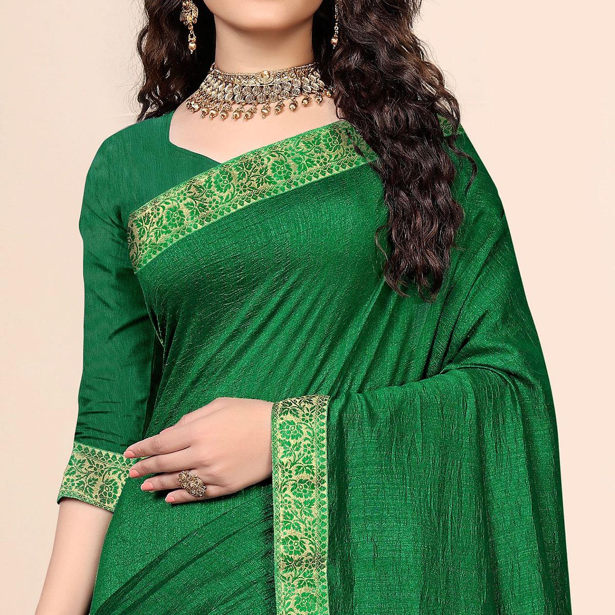 green-festive-wear-embellished-vichitra-silk-saree-142490