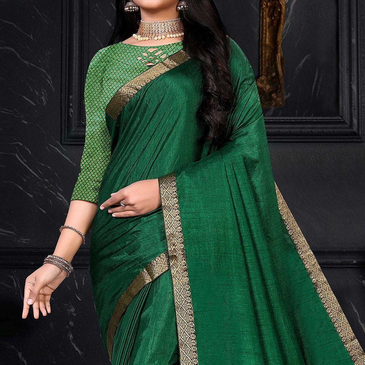 green-festive-wear-embellished-vichitra-silk-saree-142872