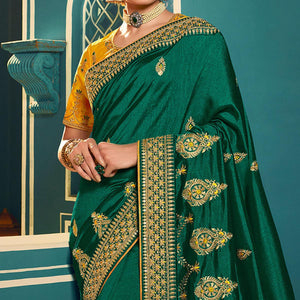 green-festive-wear-embroidered-silk-saree-123939