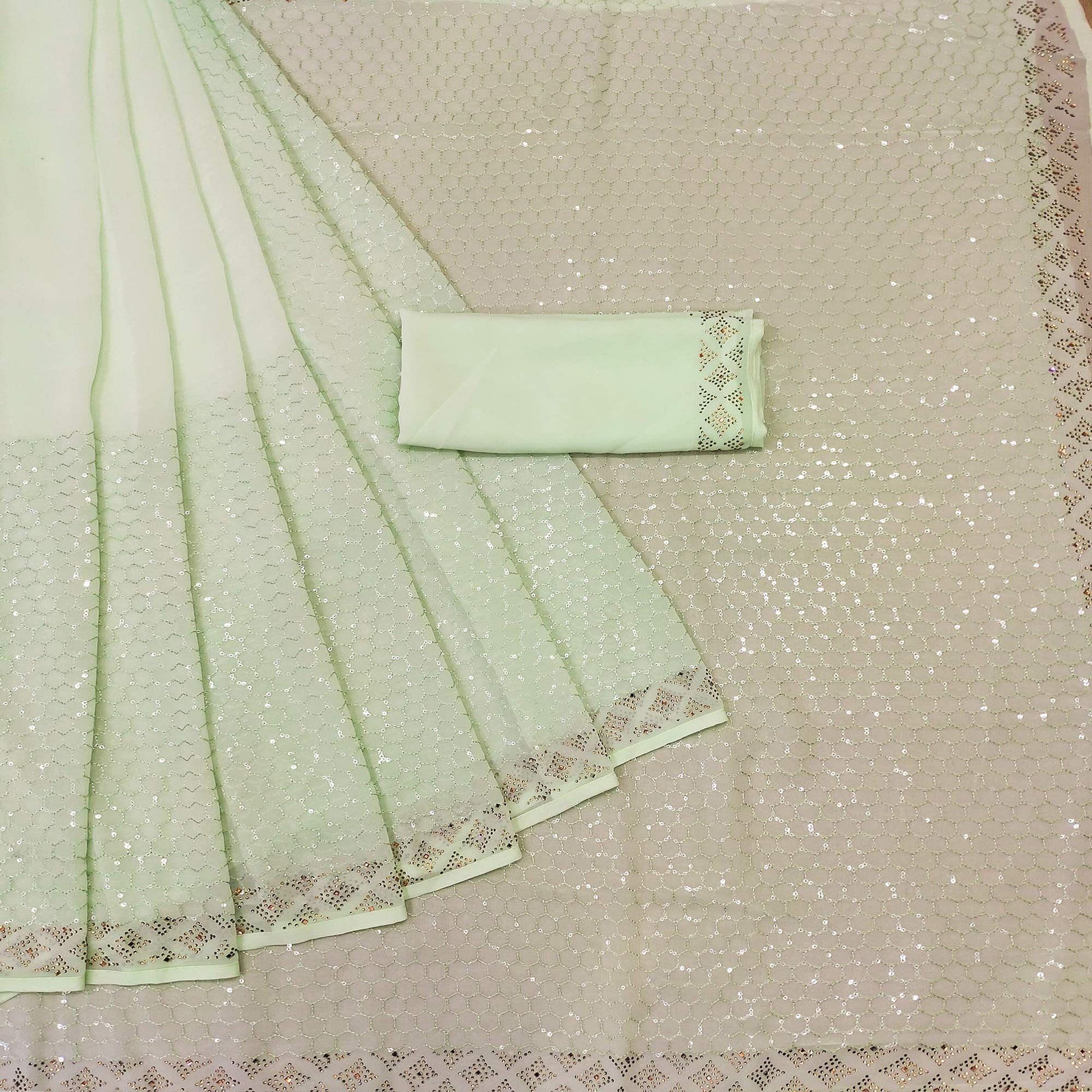 green-festive-wear-embroidery-with-embellished-georgette-saree-142530