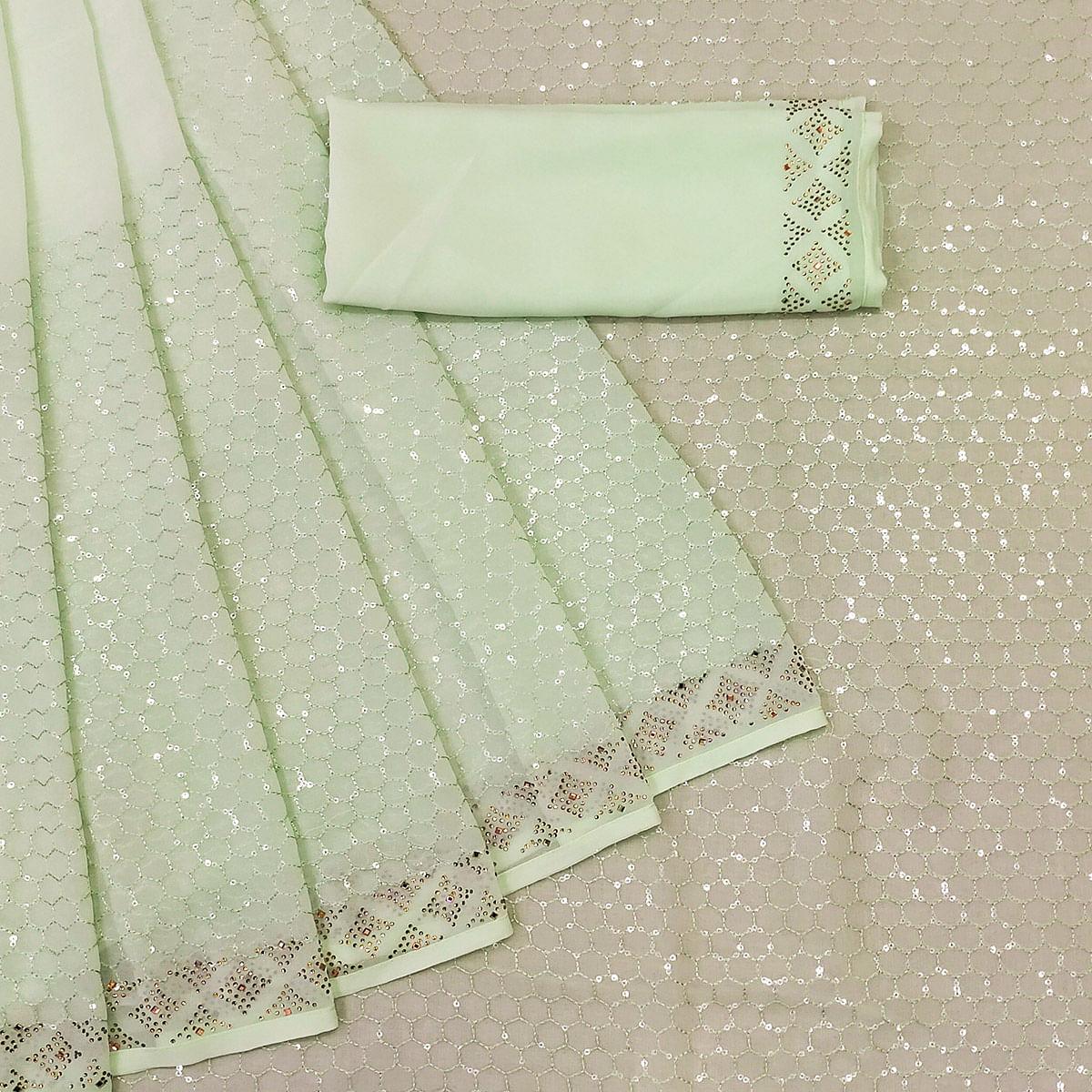 green-festive-wear-embroidery-with-embellished-georgette-saree-142530