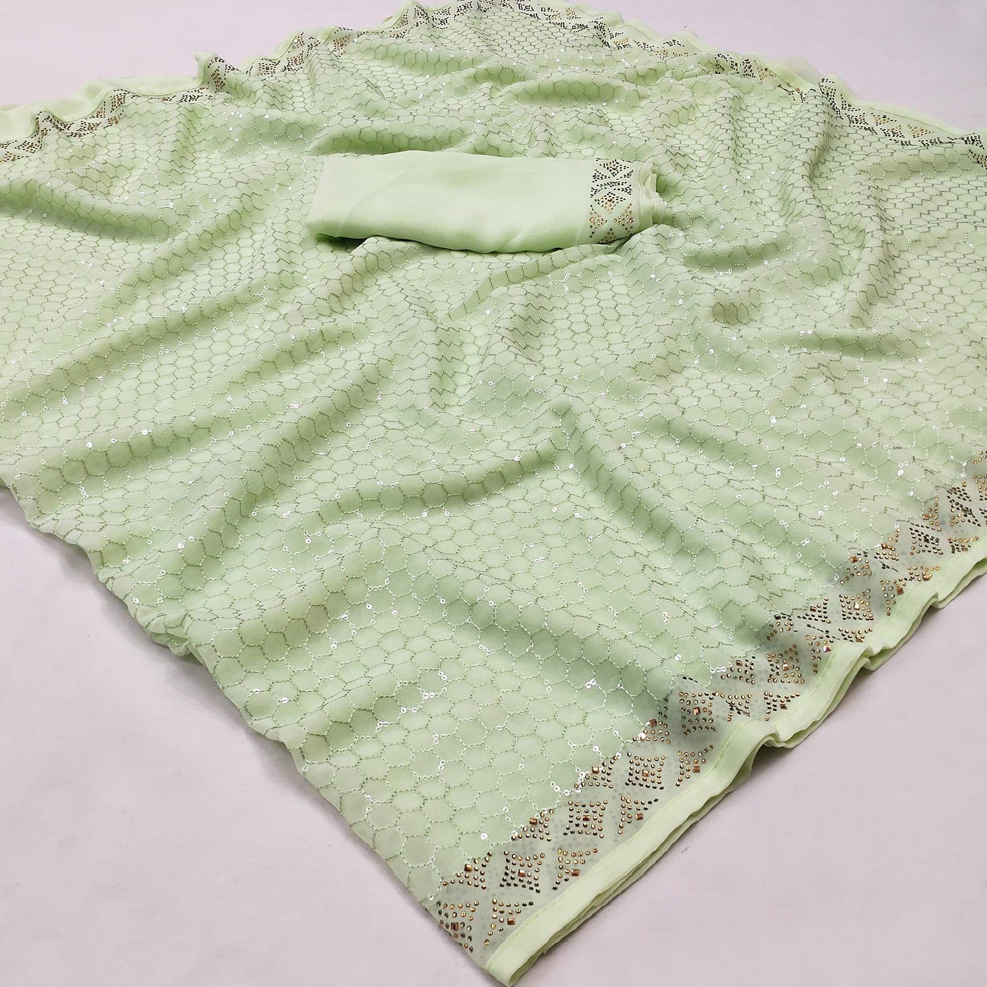 green-festive-wear-embroidery-with-embellished-georgette-saree-142530