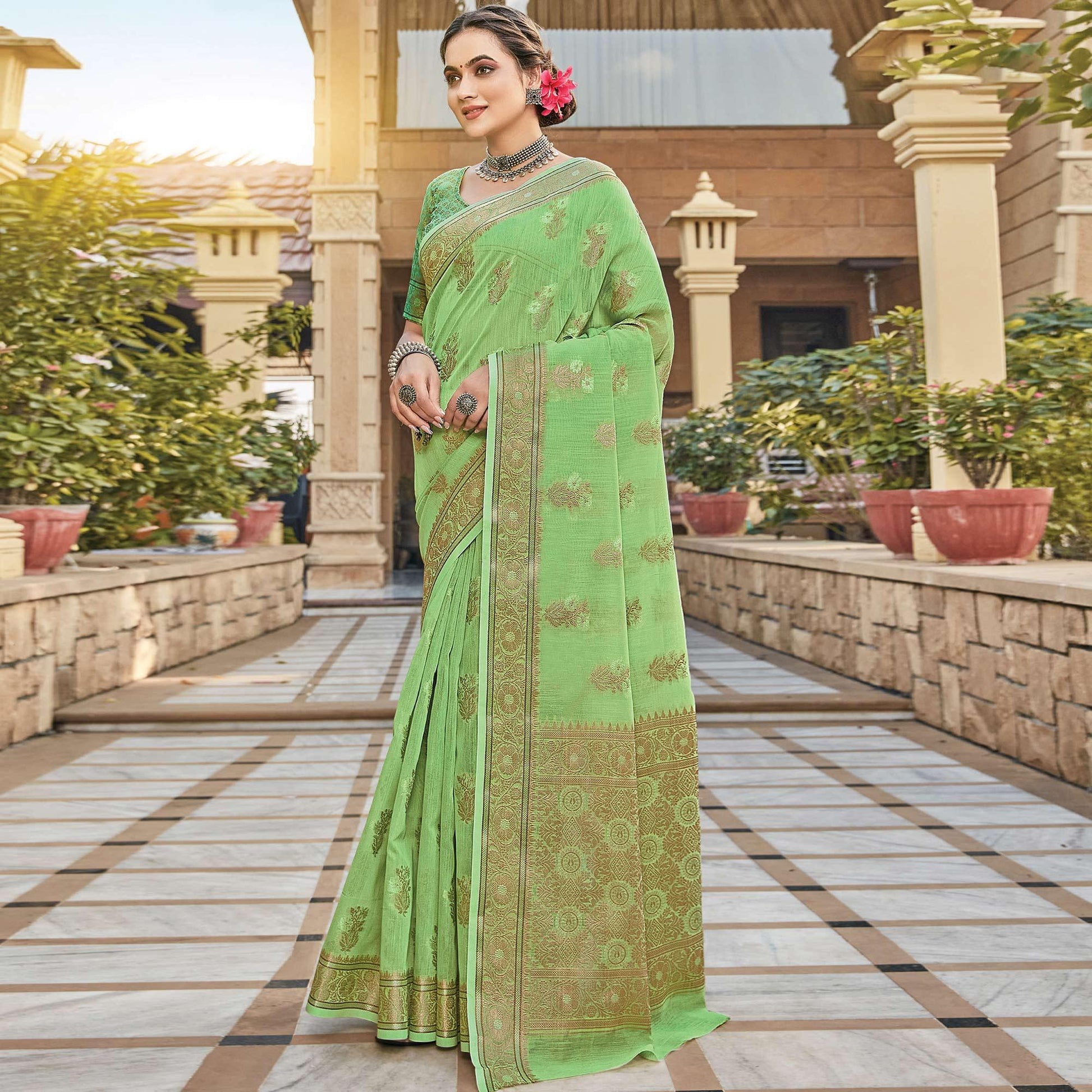 green-festive-wear-floral-woven-linen-saree-134667