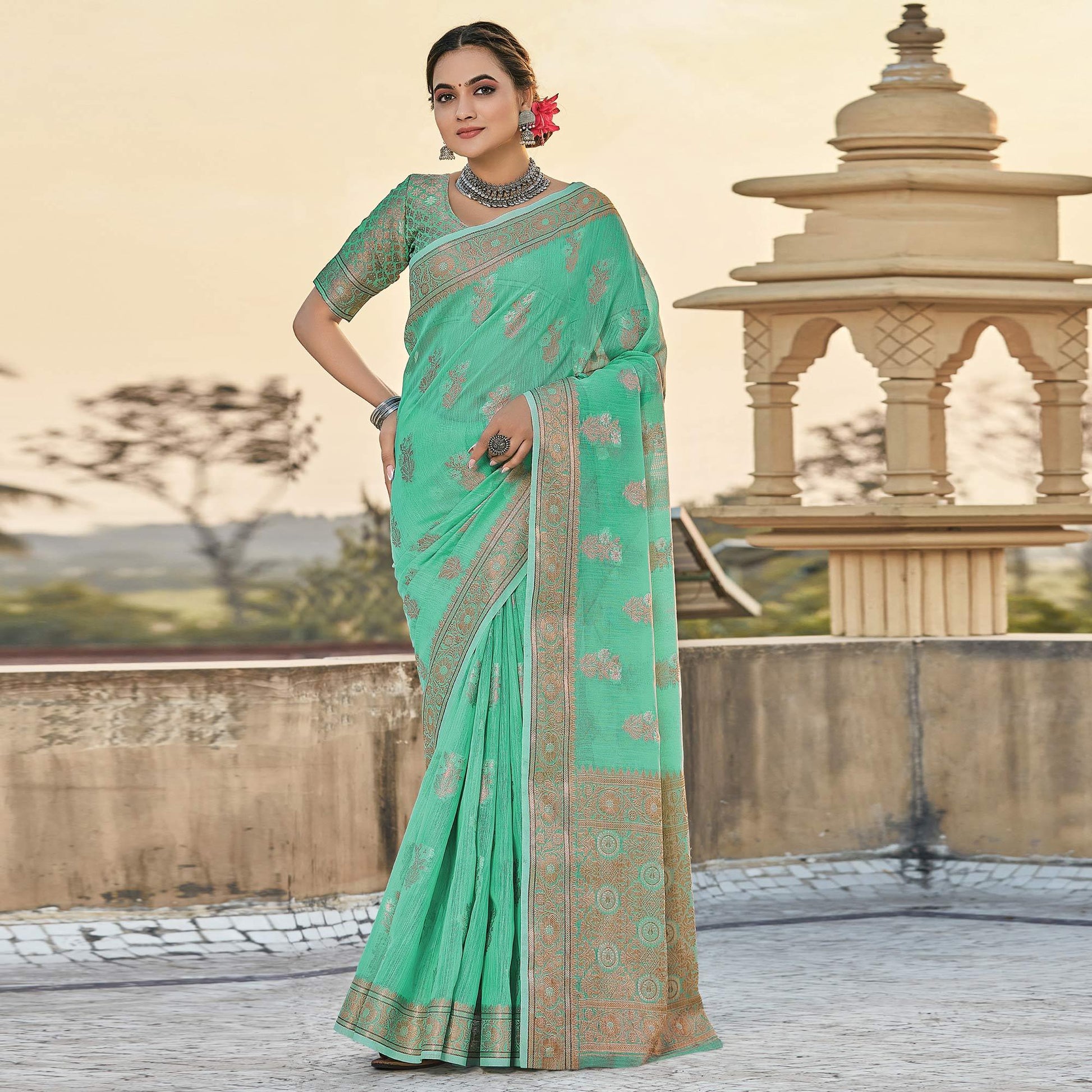 green-festive-wear-floral-woven-linen-saree-134670