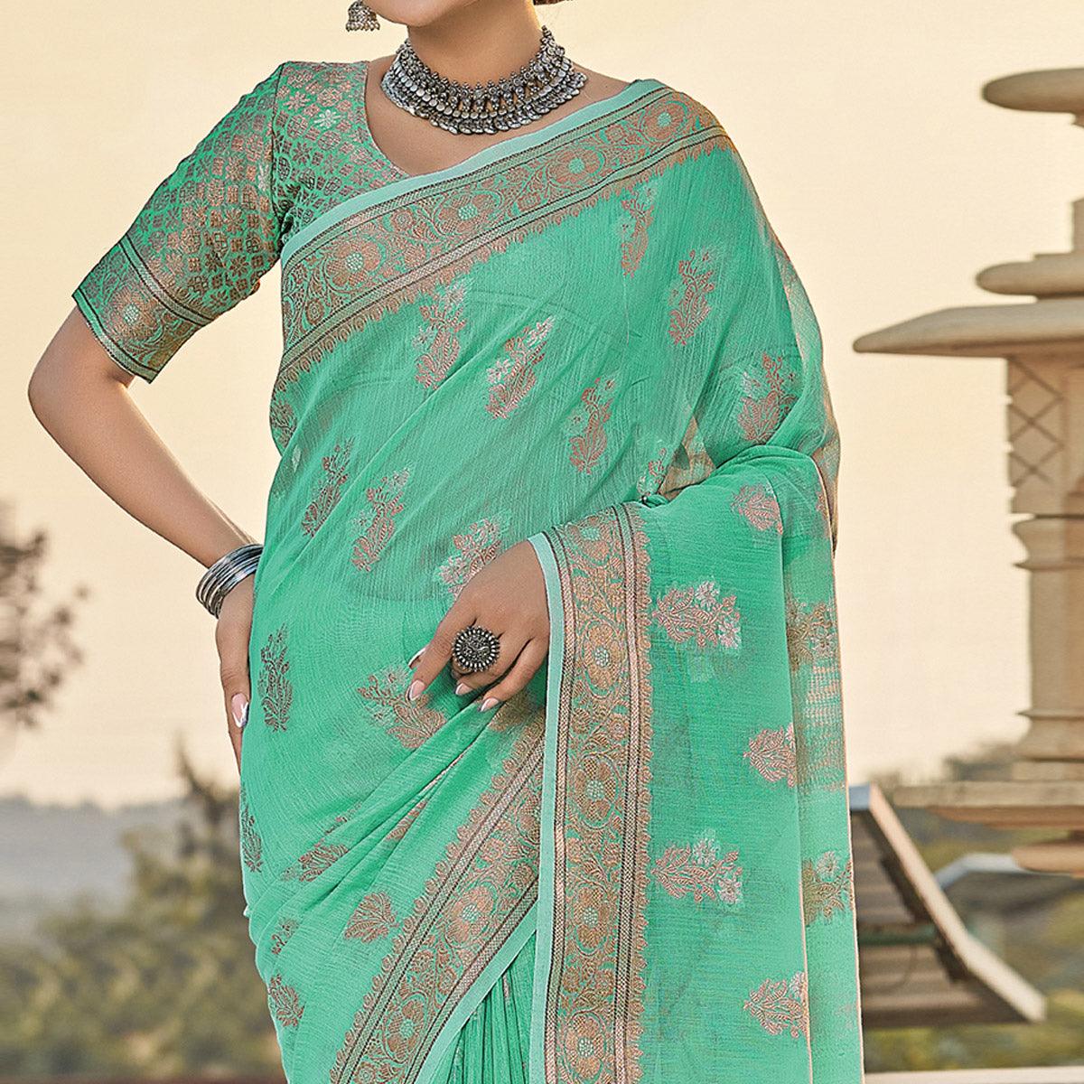 green-festive-wear-floral-woven-linen-saree-134670
