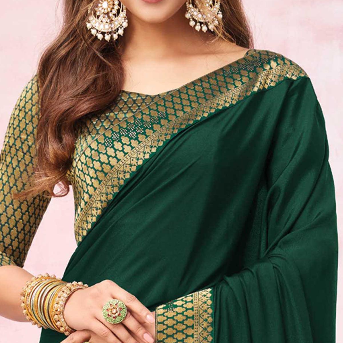 green-festive-wear-heavy-silk-saree-with-banarasi-lace-border-131992
