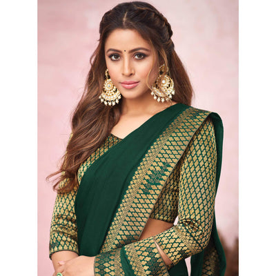 green-festive-wear-heavy-silk-saree-with-banarasi-lace-border-131992