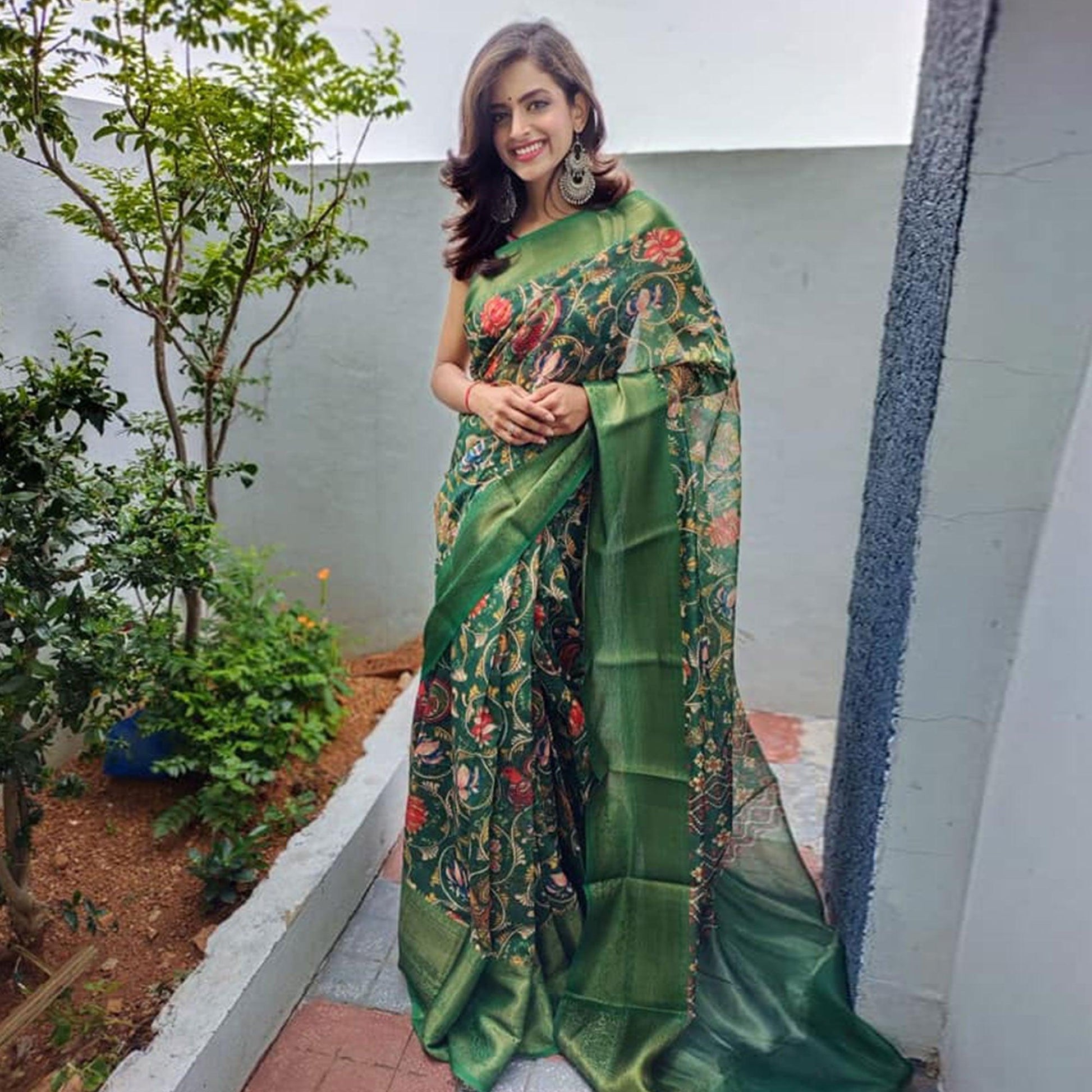 green-festive-wear-kalamkari-printed-chanderi-silk-saree-with-zari-weaving-border-128490