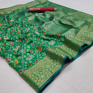 green-festive-wear-patola-printed-art-silk-saree-142923