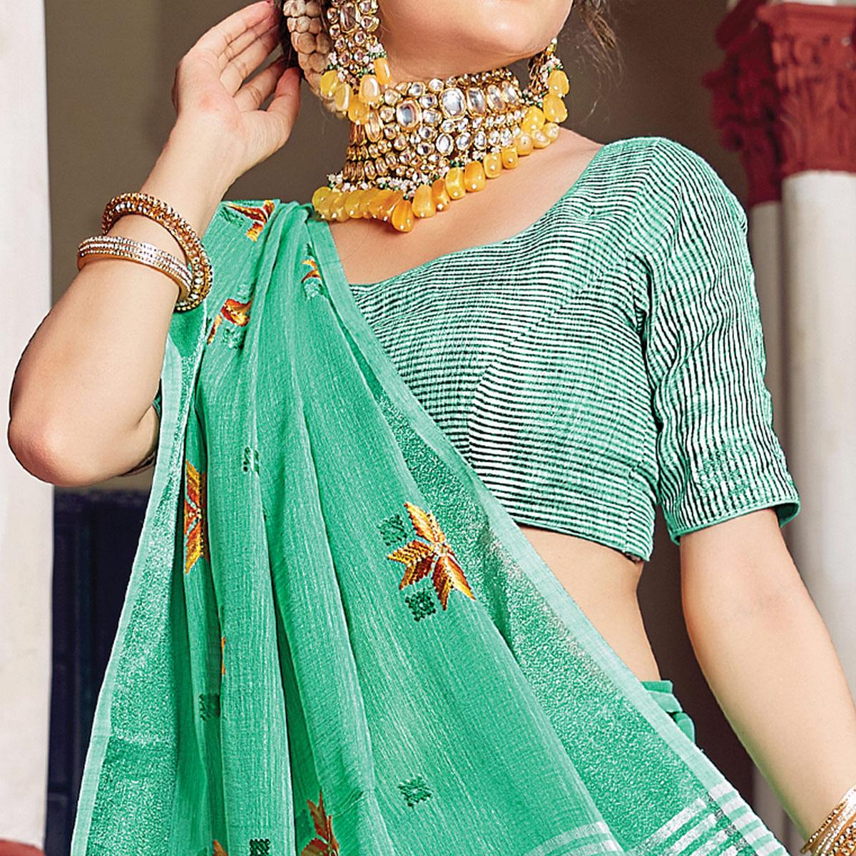 green-festive-wear-printed-linen-saree-123404