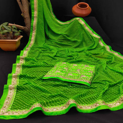 green-festive-wear-printed-with-lace-border-georgette-saree-134966