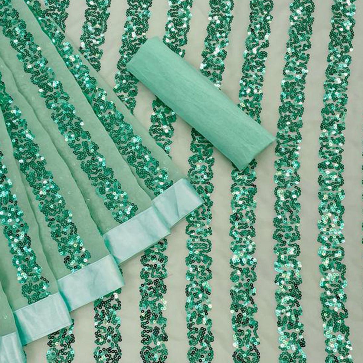 green-festive-wear-sequence-embroidered-georgette-saree-142832