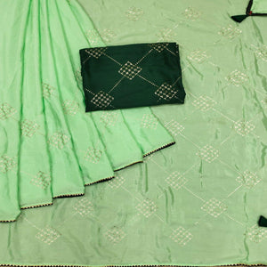 green-festive-wear-sequence-work-chiffon-saree-140229